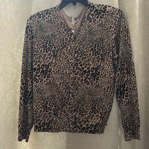 Leopard print button up blouse.